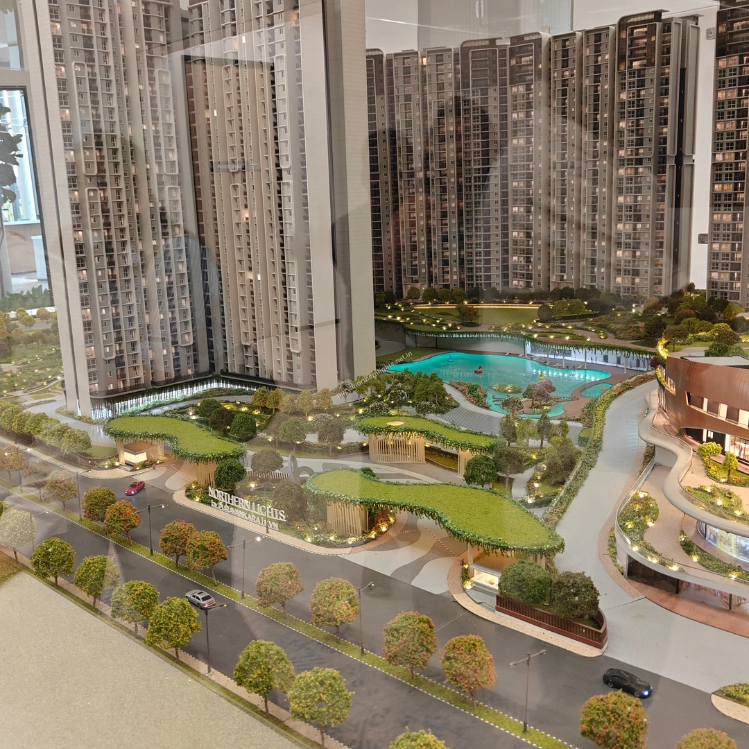 Grand Entrance View Detailed miniature model displaying the grand entrance architecture and lush green landscaping of Purva Northern Lights