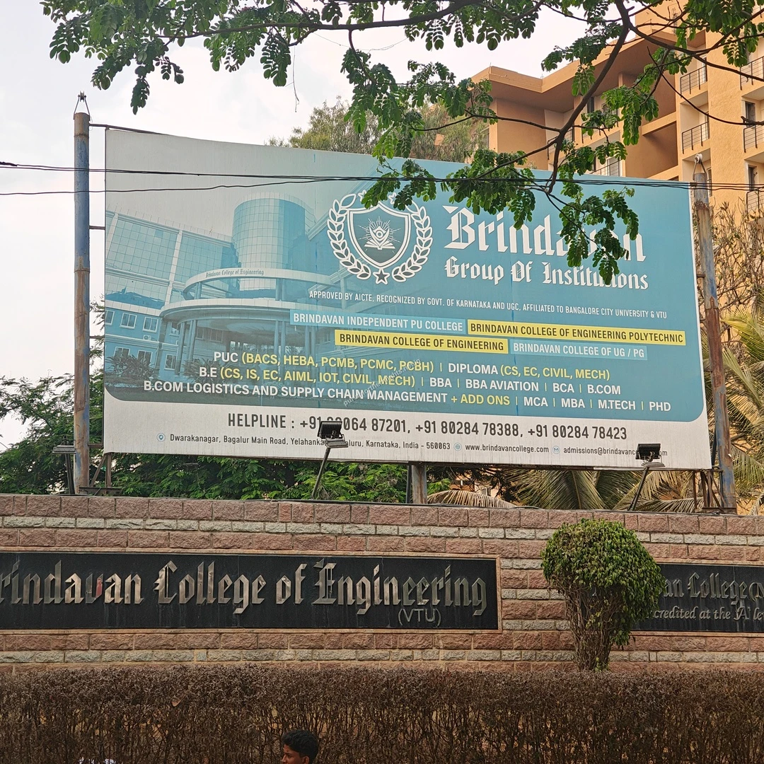 Brindavan Billboard Display A clear view of the large Brindavan College billboard listing its engineering and management programs, taken on a bright afternoon.
