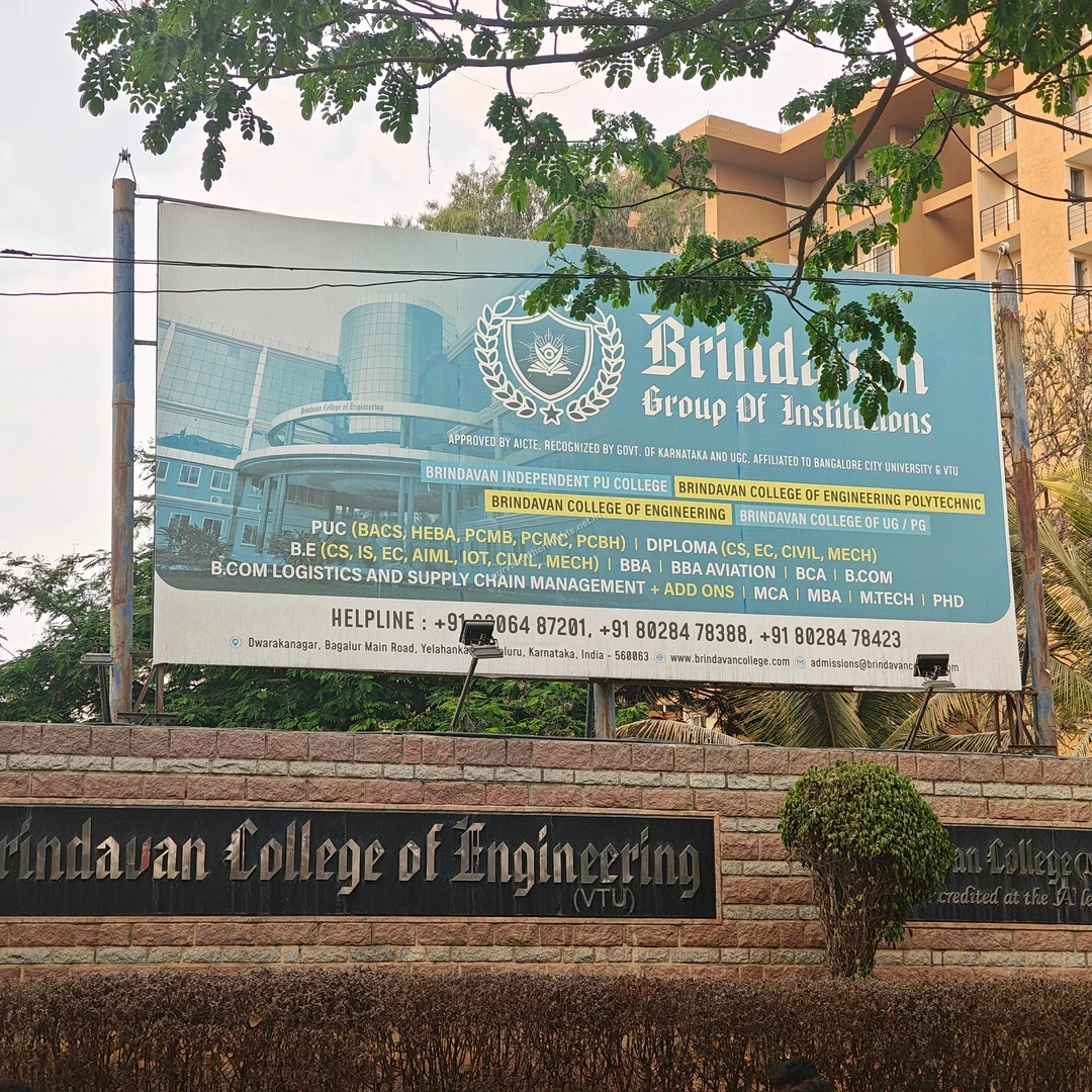 Brindavan Main Billboard The large informational billboard for Brindavan Group of Institutions mounted above a stone boundary wall, captured on Mar 13.