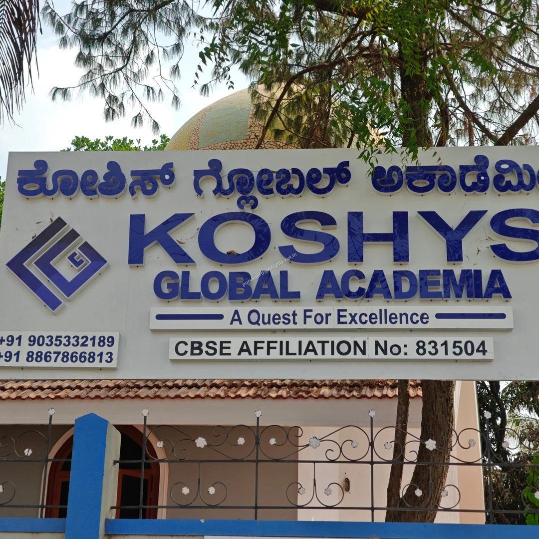 Koshys Board View A close-up view of the Koshys Global Academia signboard highlighting its CBSE affiliation near Purva Northern Lights.