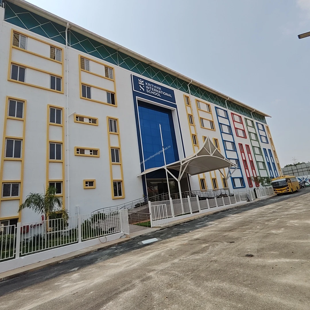 Krithvik Campus View The complete multi-story educational building of Krithvik International School showcasing its spacious infrastructure near Purva Northern Lights.