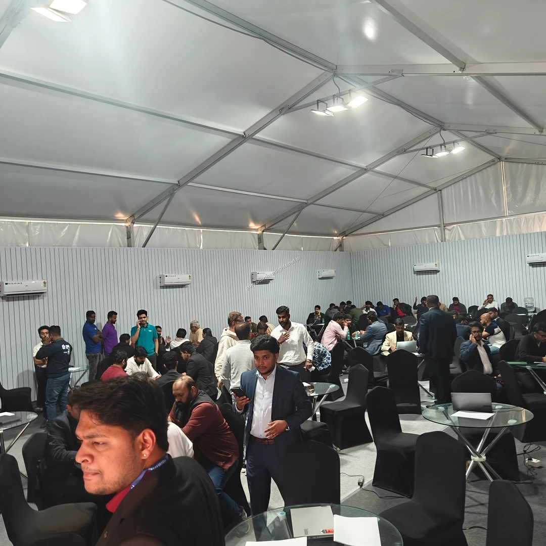 Temporary Sales Office Large gathering of clients and sales executives inside the temporary project sales office at Purva Northern Lights